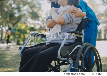 Young asian caretaker with 60s asia elderly woman consulting and encourage, take a history and recommend the right treatment to live happily in retirement, holding hands and encouraging 110534649