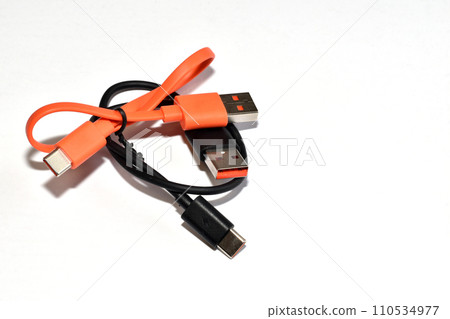 Two charging cables on white. 110534977