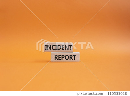 Incident Report symbol. Concept word Incident Report on wooden blocks. Beautiful orange background. Business and Incident Report concept. Copy space Incident Report symbol. Concept word Incident Report on wooden blocks. Beautiful orange background. Business and Incident Report concept. Copy space 110535018