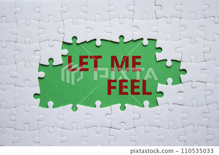 Feel symbol. Concept words Let me feel on white puzzle. Beautiful green background. Psychology and let me feel concept. Copy space. Feel symbol. Concept words Let me feel on white puzzle. Beautiful green background. Psychology and let me feel concept. Copy space. 110535033