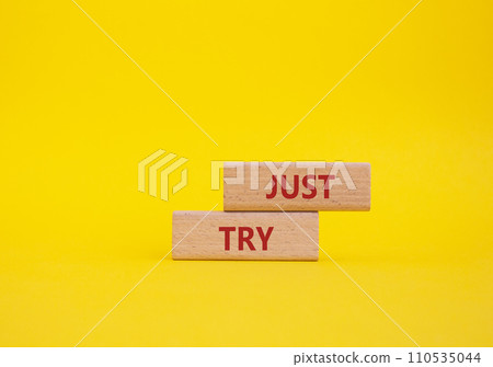 Just try symbol. Concept words Just try on wooden blocks. Beautiful yellow background. Business and Just Try concept. Copy space. Just try symbol. Concept words Just try on wooden blocks. Beautiful yellow background. Business and Just Try concept. Copy space. 110535044