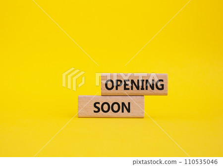 Opening soon symbol. Concept word Opening soon on wooden blocks. Beautiful yellow background. Business and Opening soon concept. Copy space Opening soon symbol. Concept word Opening soon on wooden blocks. Beautiful yellow background. Business and Opening soon concept. Copy space 110535046