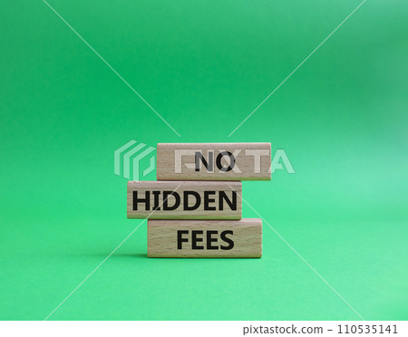 No Hidden Fees symbol. Concept words No Hidden Fees on wooden blocks. Beautiful green background. Business and No Hidden Fees concept. Copy space. 110535141