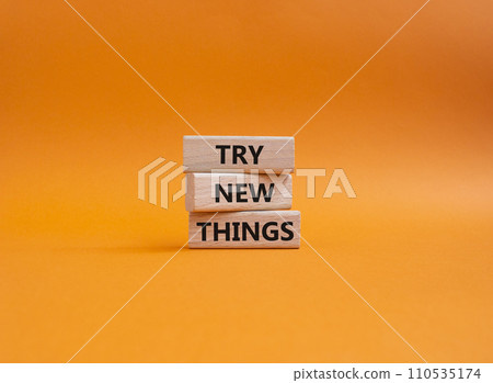 Try new Things symbol. Concept words Try new Things on wooden blocks. Beautiful orange background. Business and Try new Things concept. Copy space. Try new Things symbol. Concept words Try new Things on wooden blocks. Beautiful orange background. Business and Try new Things concept. Copy space. 110535174