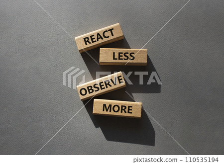 React less Observe more symbol. Wooden blocks with words React less Observe more. Beautiful grey background. Business and React less Observe more. Copy space. 110535194