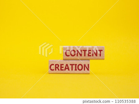 Content creation symbol. Concept word Content creation on wooden blocks. Businessman hand. Beautiful yellow background. Business and Content creation concept. Copy space 110535388
