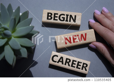 Begin new career symbol. Concept word Begin new career on wooden blocks. Businessman hand. Beautiful grey background with succulent plant. Business and Begin new career concept. Copy space Begin new career symbol. Concept word Begin new career on wooden blocks. Businessman hand. Beautiful grey background with succulent plant. Business and Begin new career concept. Copy space 110535405