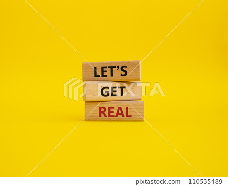 Lets get real symbol. Concept words Lets get real on wooden blocks. Beautiful yellow background. Business and Lets get real concept. Copy space. 110535489