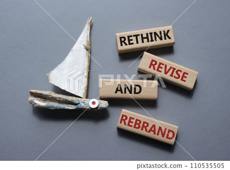 Rethink Revise and Rebrand symbol. Wooden blocks with words Rethink Revise and Rebrand. Beautiful grey background with boat. Business and Rethink Revise and Rebrand concept. Copy space. Rethink Revise and Rebrand symbol. Wooden blocks with words Rethink Revise and Rebrand. Beautiful grey background with boat. Business and Rethink Revise and Rebrand concept. Copy space. 110535505