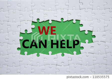 We can help symbol. Concept words We can help on white puzzle. Beautiful green background. Business and We can help concept. Copy space. 110535575