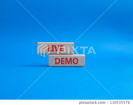 Live Demo symbol. Concept word Live Demo on wooden blocks. Beautiful blue background. Business and Live Demo concept. Copy space 110535578