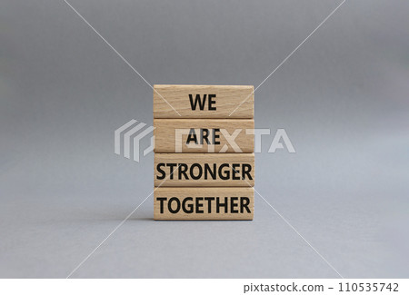 We are stronger together symbol. Wooden blocks with words We are stronger together. Beautiful grey background. We are stronger together concept. Copy space. We are stronger together symbol. Wooden blocks with words We are stronger together. Beautiful grey background. We are stronger together concept. Copy space. 110535742