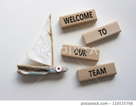 Welcome to our team symbol. Concept words Welcome to our team on wooden blocks. Beautiful white background with boat. Business and Welcome to our team concept. Copy space. Welcome to our team symbol. Concept words Welcome to our team on wooden blocks. Beautiful white background with boat. Business and Welcome to our team concept. Copy space. 110535798