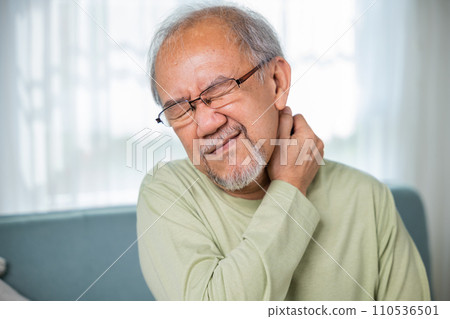 Old man suffering from nape neck pain at home, Elderly acute neckaches, Sad senior man neckache hand holding neck, Old age retirement health problems unhealthy diseased, shoulder pain Old man suffering from nape neck pain at home, Elderly acute neckaches, Sad senior man neckache hand holding neck, Old age retirement health problems unhealthy diseased, shoulder pain 110536501