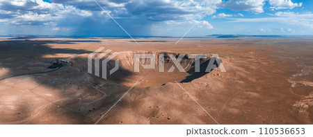 Aerial view of the Meteor Crater Natural Landmark at Arizona. Crater from a meteorite, from space. Elements of this image furnished by NASA. High quality photo Aerial view of the Meteor Crater Natural Landmark at Arizona. Crater from a meteorite, from space. Elements of this image furnished by NASA. High quality photo 110536653
