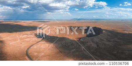 Aerial view of the Meteor Crater Natural Landmark at Arizona. Crater from a meteorite, from space. Elements of this image furnished by NASA. High quality photo 110536706