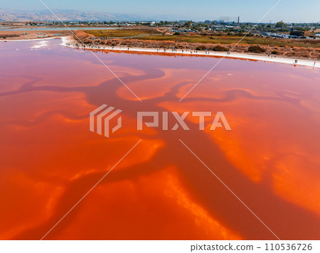 Aerial view of the Pink salt ponds at Alviso Marina County Park, gateway to the Don Edwards San Francisco Bay National Wildlife Refuge 110536726