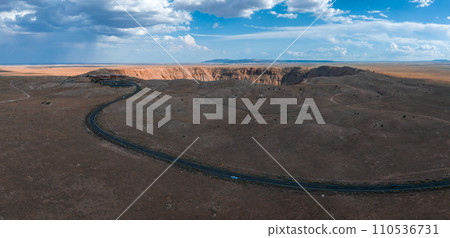 Aerial view of the Meteor Crater Natural Landmark at Arizona. Crater from a meteorite, from space. Elements of this image furnished by NASA. High quality photo 110536731