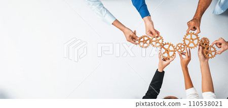 Business team joining cogwheel in circular together. Prudent 110538021