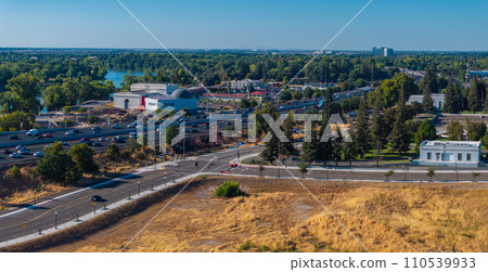 The Tower Bridge in Sacramento, California with the city of of Sacramento in the background and blue sky The Tower Bridge in Sacramento, California with the city of of Sacramento in the background and blue sky 110539933