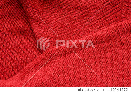 Red knitted wool texture background 110541372