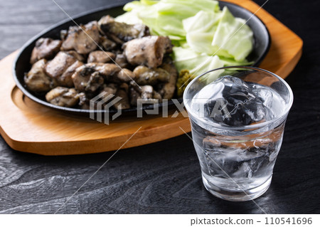 Shochu and local chicken baked Shochu and local chicken baked 110541696