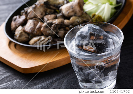Shochu and local chicken baked Shochu and local chicken baked 110541702