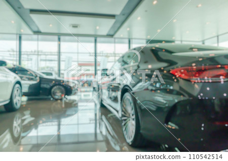 new cars in showroom interior blurred abstract background 110542514