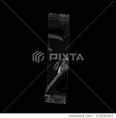 adhesive plastic tape isolated on black background adhesive plastic tape isolated on black background 110542925