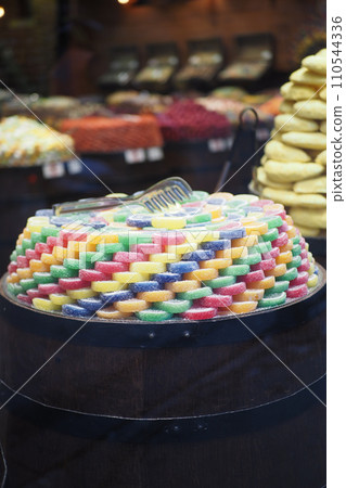 sugar coated jelly beans in the form of colored sliced fruit sugar coated jelly beans in the form of colored sliced fruit 110544336