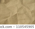 The brown craft paper texture background has a crumple look. 110545905