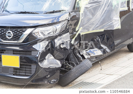 dented car being repaired dented car being repaired 110546884