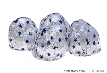chocolate candies in foil isolated chocolate candies in foil isolated 110550461