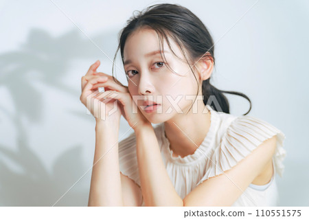 Beauty image of a woman with natural makeup Beauty image of a woman with natural makeup 110551575