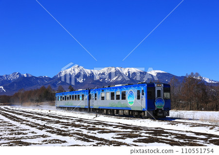 HighRail1375 going through Mt. Yatsugatake and the snow-covered Nobeyama Plateau 110551754