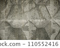 Pattern of grey volumetric texture made by casting wall ready for replicate on background. Unusual relief embossment . Concrete wall with traces of aging cracks, destruction and streaks 110552416