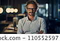 Experienced entrepreneur in his 50s wearing glasses stands confidently in his office, arms crossed. Generative AI. 110552597