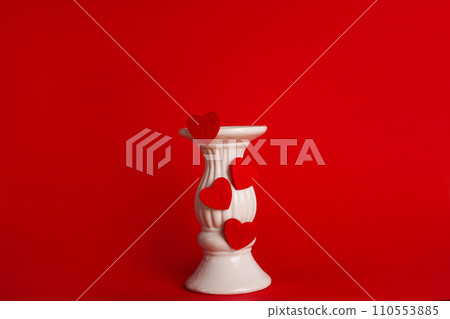White podium with red hearts on red background to show cosmetic products. Minimal romantic backdrop with stand for branding and presentation on Valentine's Day White podium with red hearts on red background to show cosmetic products. Minimal romantic backdrop with stand for branding and presentation on Valentine's Day 110553885