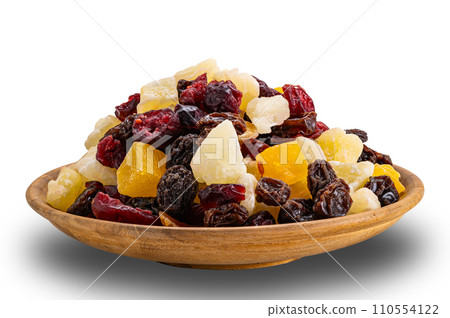 View of delicious sweet dried tropical fruit in wooden plate. 110554122