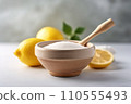 Eco-Cleaning Harmony: Sliced Lemon and Baking Soda Household Concept 110555493