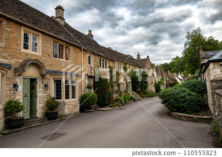 Picturesque Village Castle Combe In The Cotswolds Area In Wiltshire In England, United Kingdom Picturesque Village Castle Combe In The Cotswolds Area In Wiltshire In England, United Kingdom 110555823