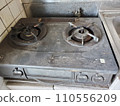 Dirty gas stove that wasn't cleaned, the kitchen after the homeowner lived alone and was hospitalized 110556209