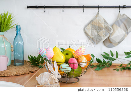 Interior of light scandinavian kitchen with Easter decor Interior of light scandinavian kitchen with Easter decor 110556268