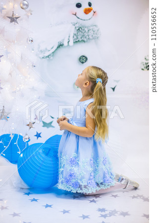 Portrait of a beautiful Russian girl in a kokoshnik and traditional dress 110556652