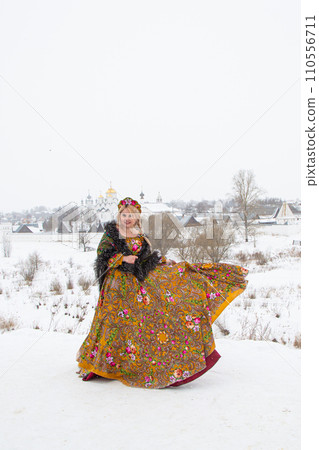 beautiful Russian girl in a winter national dress 110556711