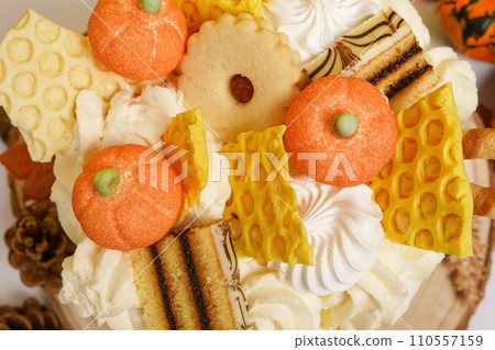 Autumn dessert with pumpkins and cookies, thanksgiving cooking Autumn dessert with pumpkins and cookies, thanksgiving cooking 110557159