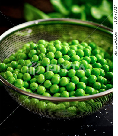 AI-generated content. Green peas in a metal colander with water drops, copy space, AI generated AI-generated content. Green peas in a metal colander with water drops, copy space, AI generated 110558324