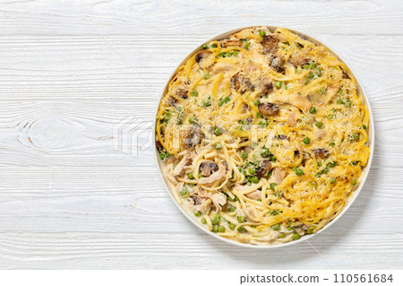 baked chicken tetrazzini in baking dish, top view baked chicken tetrazzini in baking dish, top view 110561684