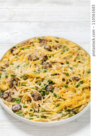 baked chicken tetrazzini in baking dish, top view baked chicken tetrazzini in baking dish, top view 110561685