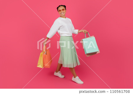 Big Sales. Excited Happy Asian Woman Holding Bright Shopping Bags In Hands 110561708